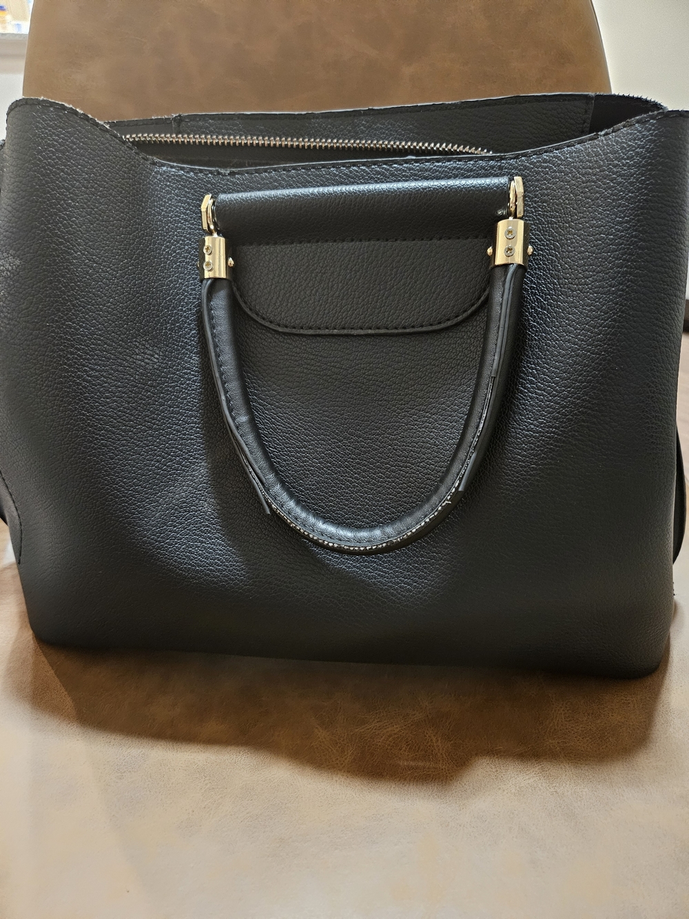 Elegant Black Leather Tote Bag with Gold Hardware